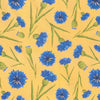 Gelbes Kornblumen Stoffmuster mit blauen Kornblumenblüten