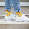 Gelbe Socken mit hellgrauen Bembeln für Apfelweinfreunde